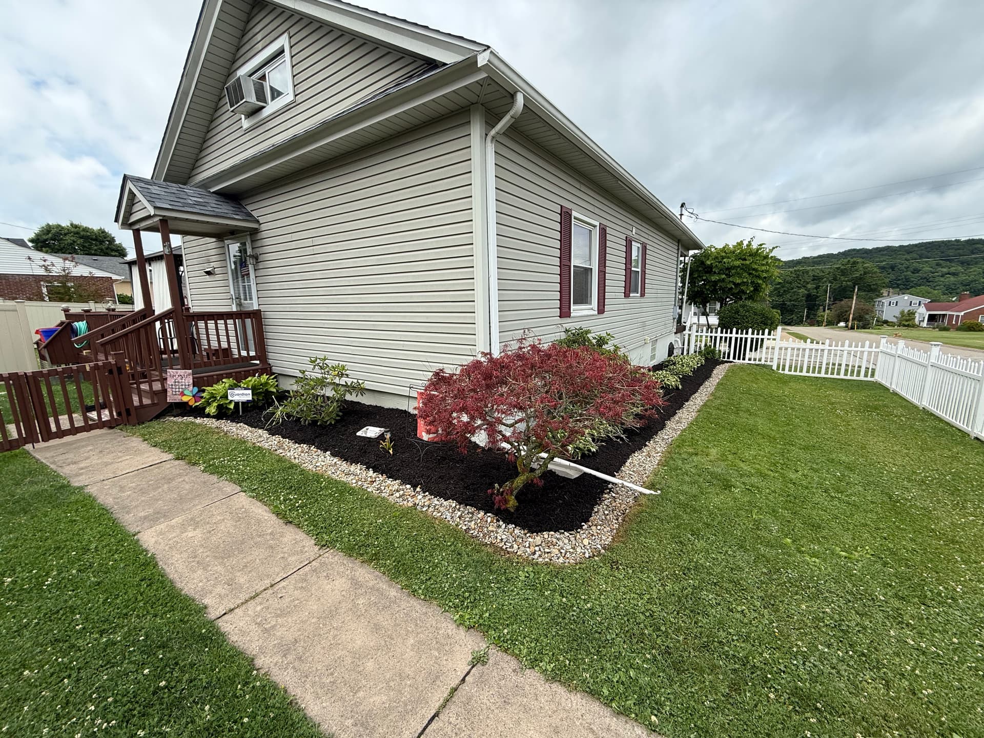 Gallery photos for Mulch and River Rock Refresh That Keeps Curb Appeal Sharp: Image #3