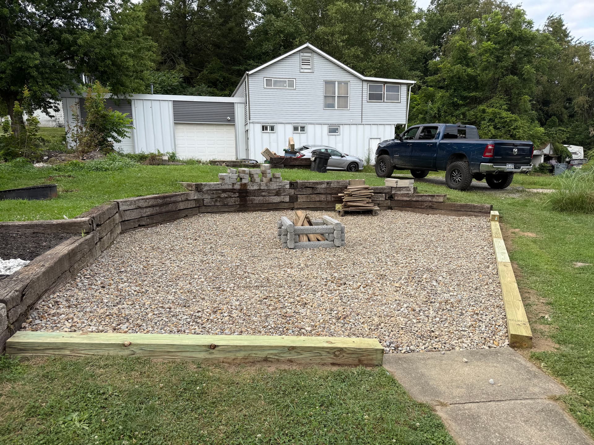 Gallery photos for Backyard Fire Pit Gathering Space Built from the Ground Up: Image #1