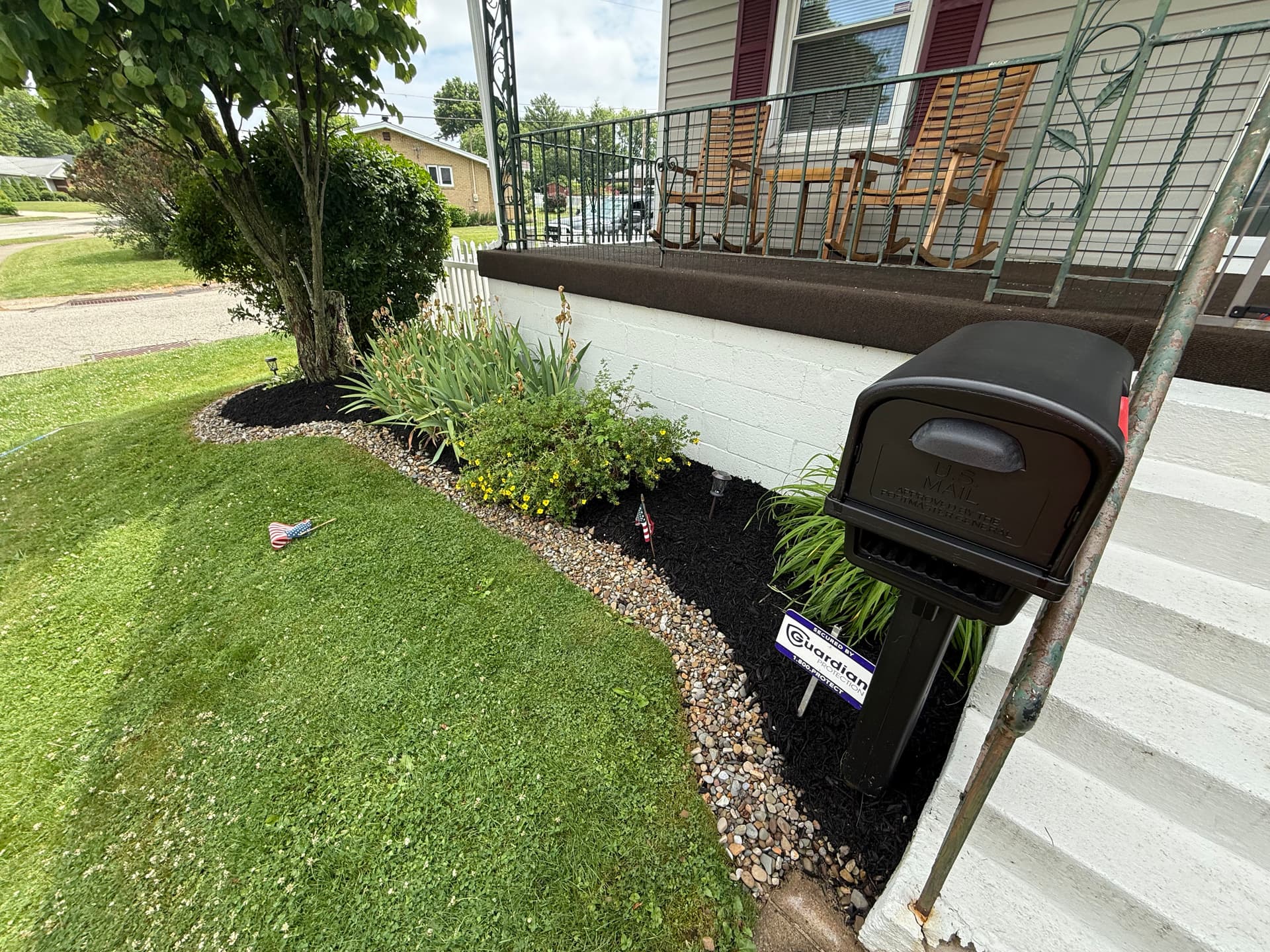 Mulch and River Rock Refresh That Keeps Curb Appeal Sharp image