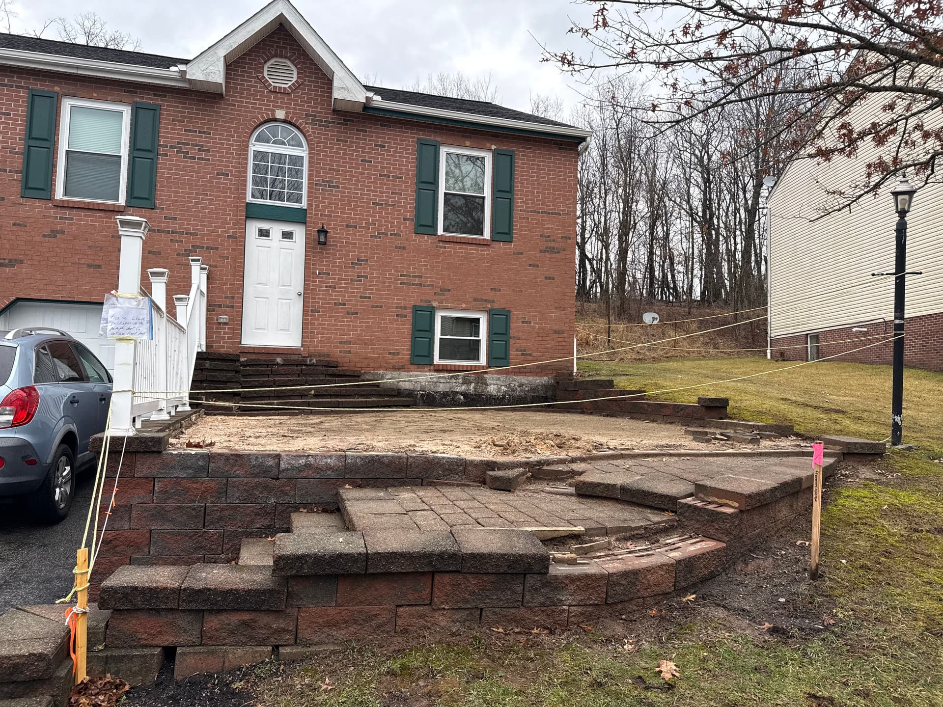 Failing Retaining Wall Replaced With a Full Outdoor Upgrade image