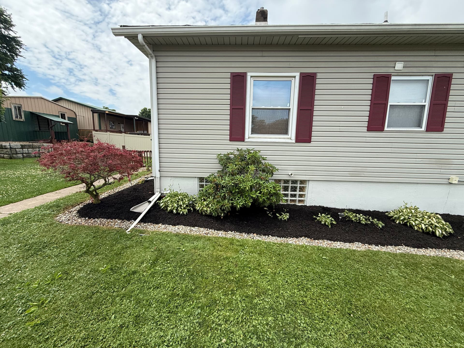 Gallery photos for Mulch and River Rock Refresh That Keeps Curb Appeal Sharp: Image #2