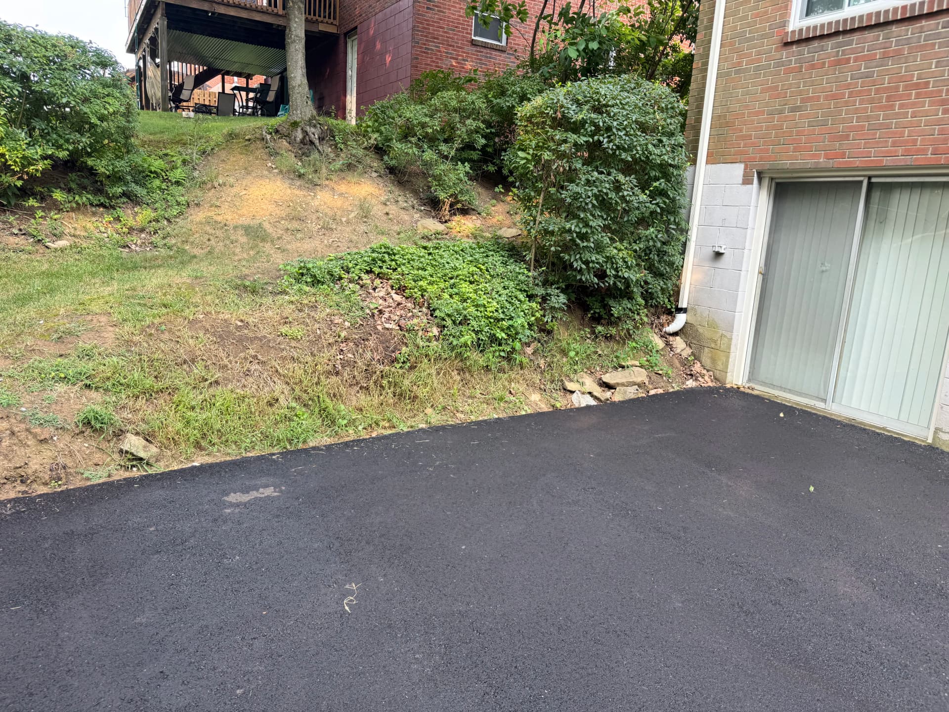 Gallery photos for Versa-Lok Retaining Wall Built to Hold a Sloped Yard in Place: Image #3