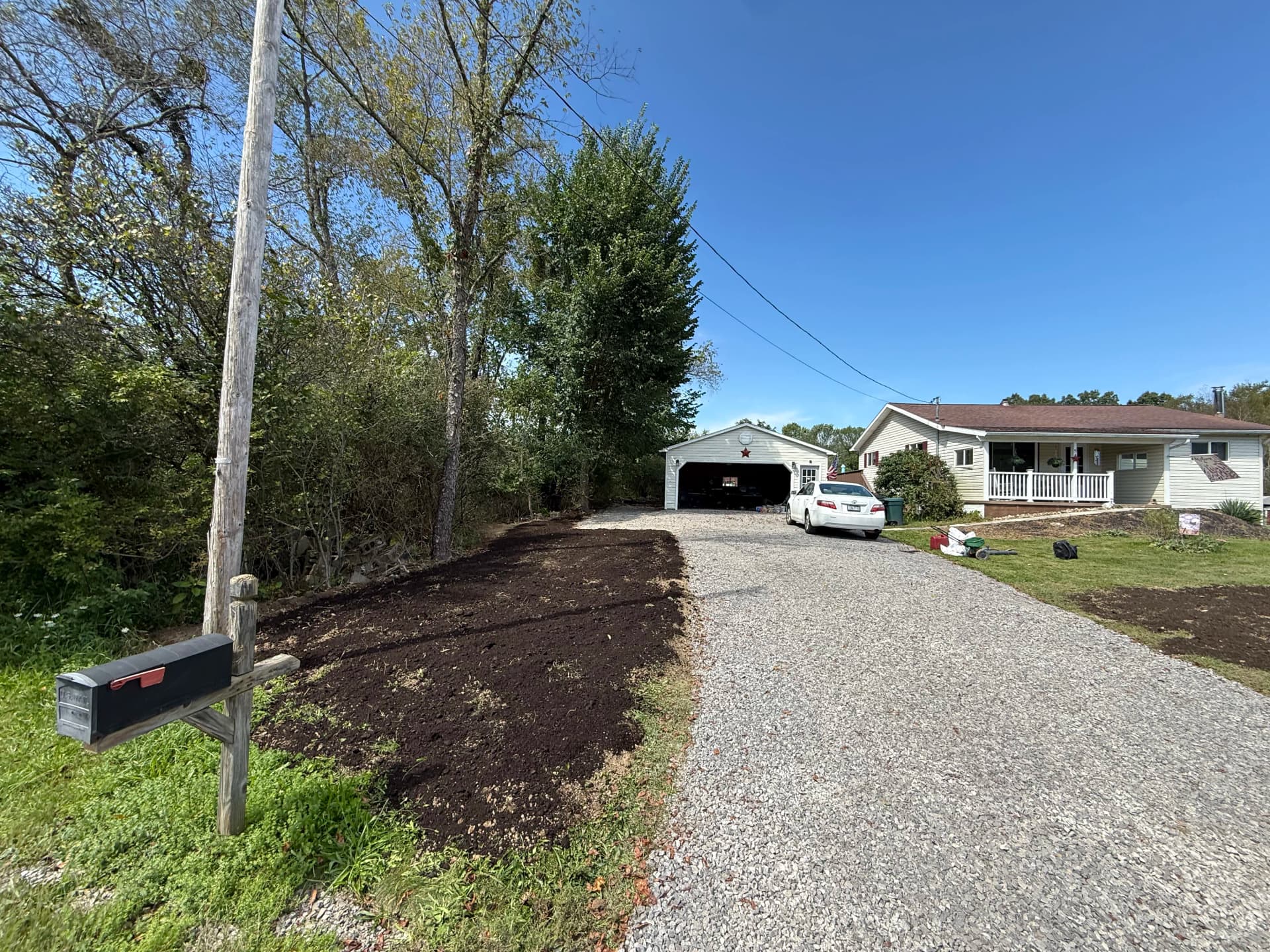 Gravel Driveway Install, Parking Expansion and Lawn Grading Done Right image