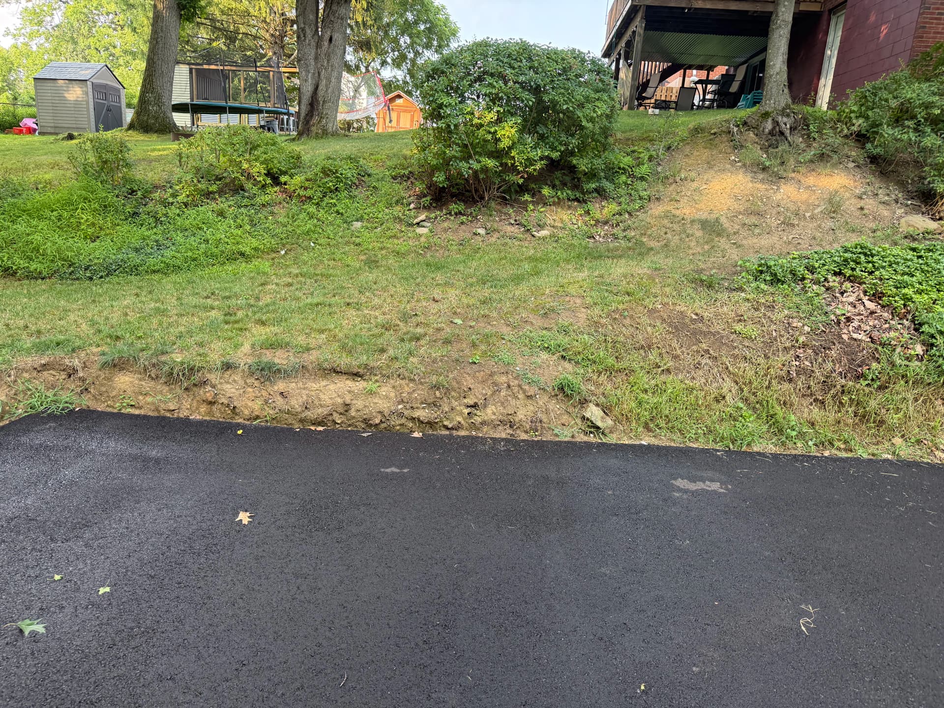 Gallery photos for Versa-Lok Retaining Wall Built to Hold a Sloped Yard in Place: Image #4