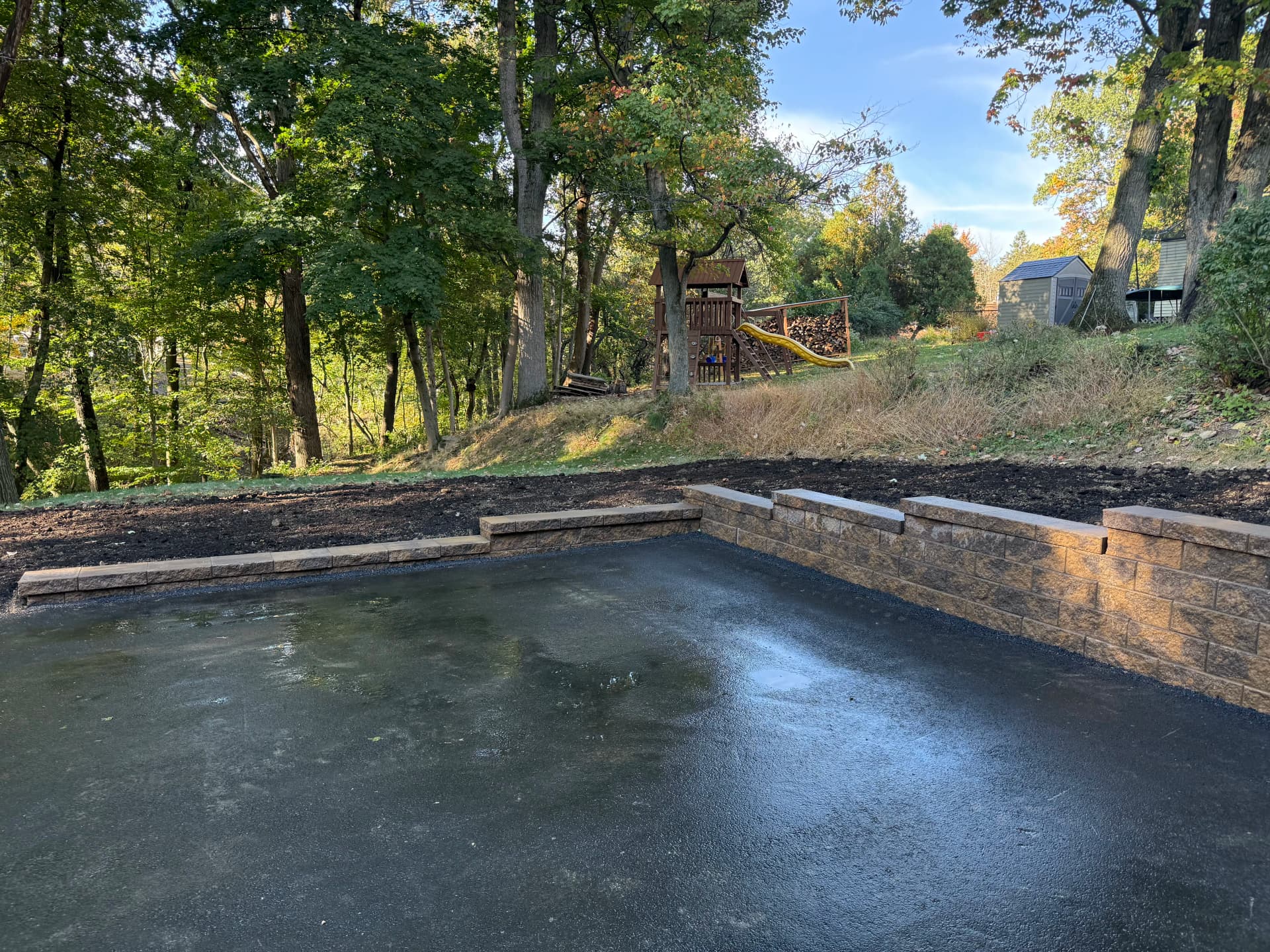 Gallery photos for Versa-Lok Retaining Wall Built to Hold a Sloped Yard in Place: Image #2